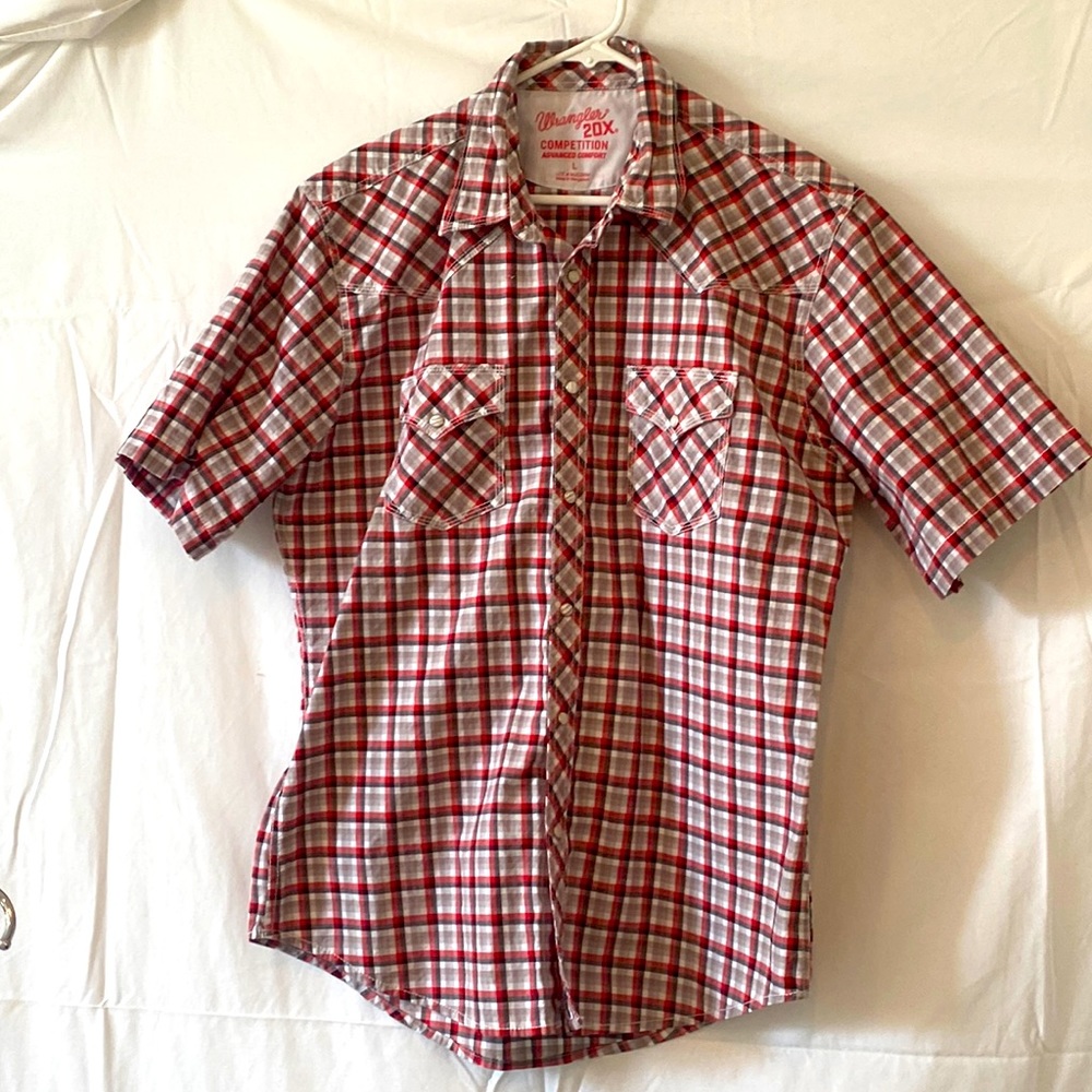 Men’s Wrangler 20X short sleeved, pearl snapped, plaid red shirt.